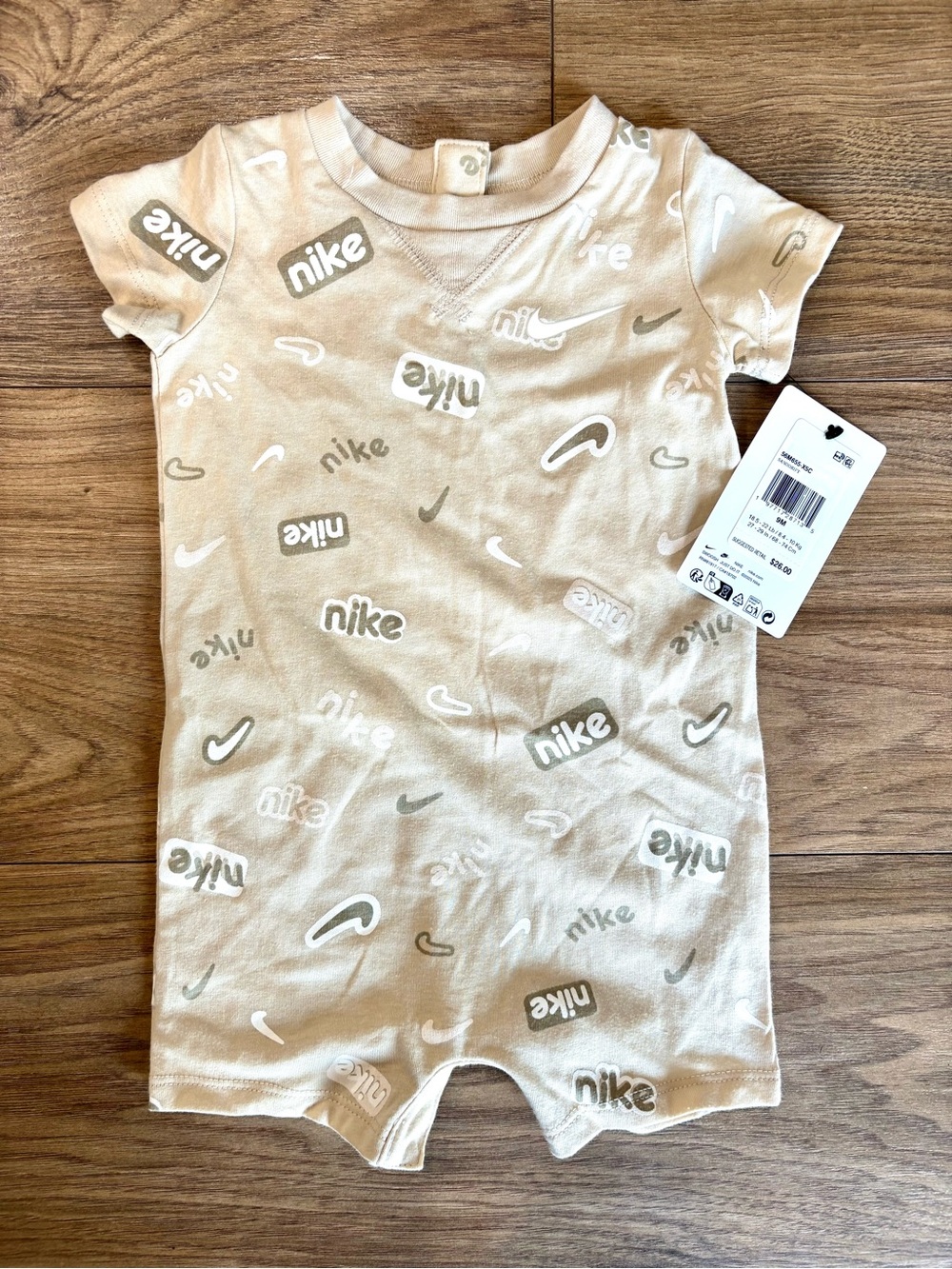 Nike Beige Allover Logo Baby One-Piece